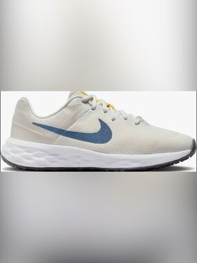 Nike Kids White Sneaker with Blue Swoosh and Yellow Accent